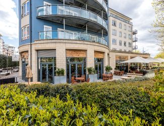 Exterior image of the Beaufort pub showcasing their pub garden