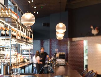 upstairs bar with stools all around