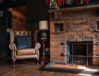 Fireplace in the historic Bear pub in Cobham