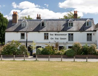 Exterior of the Wheatsheaf on Esher Green