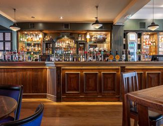 Wood panelled bar at the Cock Tavern