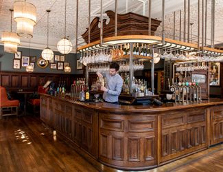 the downstairs wood panelled bar