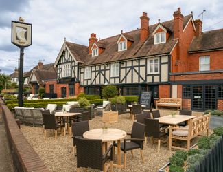 Patio area at the front of The Chequers, Walton on the Hill