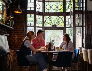 Interiors of the Coach & Horses pub in Barnes