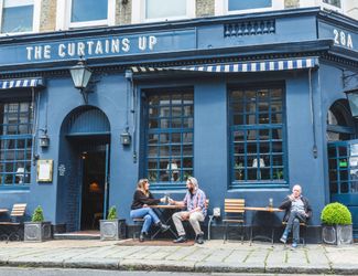 Exterior of The Curtains Up pub